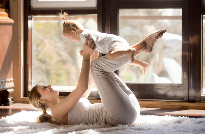 5 Tips for Navigating Postpartum Fitness by Amy Snelling